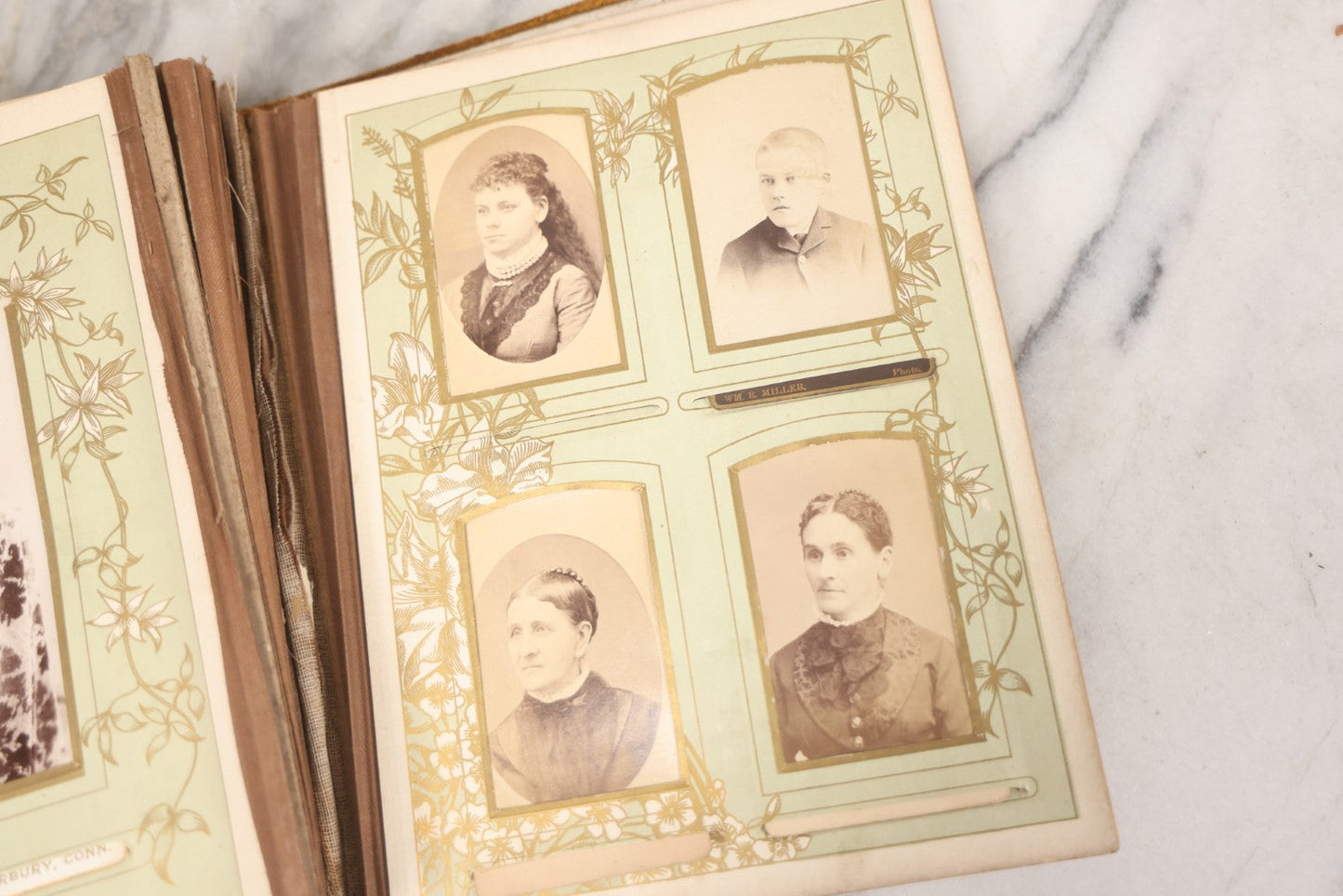 Lot 011 - Antique Victorian Photo Album With Yellow Velvet Cover, Celluloid Shell Decoration With Crab, Containing 28 Cabinet Card And Twelve C.D.V. Photographs, Including Co-Ed Class Photo, Little Girl Holding Bisque Doll, Note Binding Completely Shot