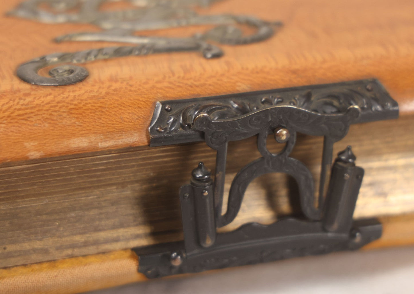 Lot 012 - Antique Victorian Photo Album With Wood Cover And Silverplate Emblem, Containing Twenty Antique Photographs Of Various Types, Including Man In Office, Children With Pram, Man With White Beard, Note Binding Wear Cover Loosening