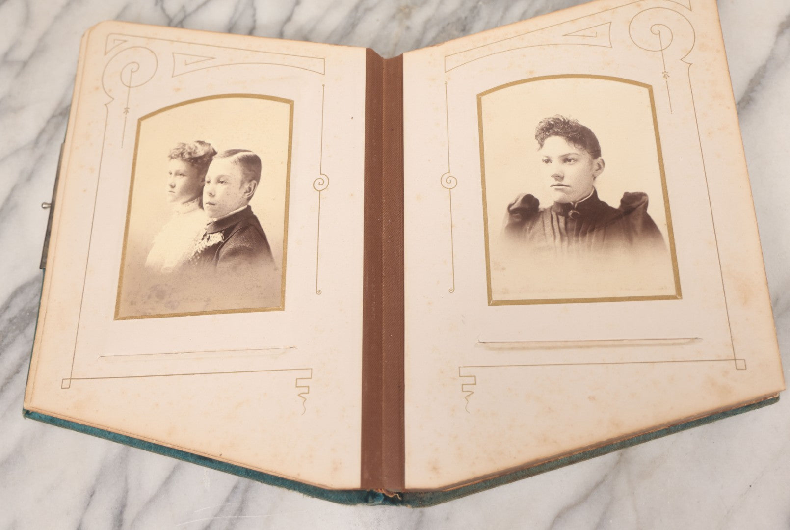 Lot 014 - Antique Victorian Photo Album With Unique Parallelogram Shape And Blue Velvet Covering, Containing 17 Cabinet Card, Three C.D.V. And Four Smaller Photographs, Of Men, Women And Children