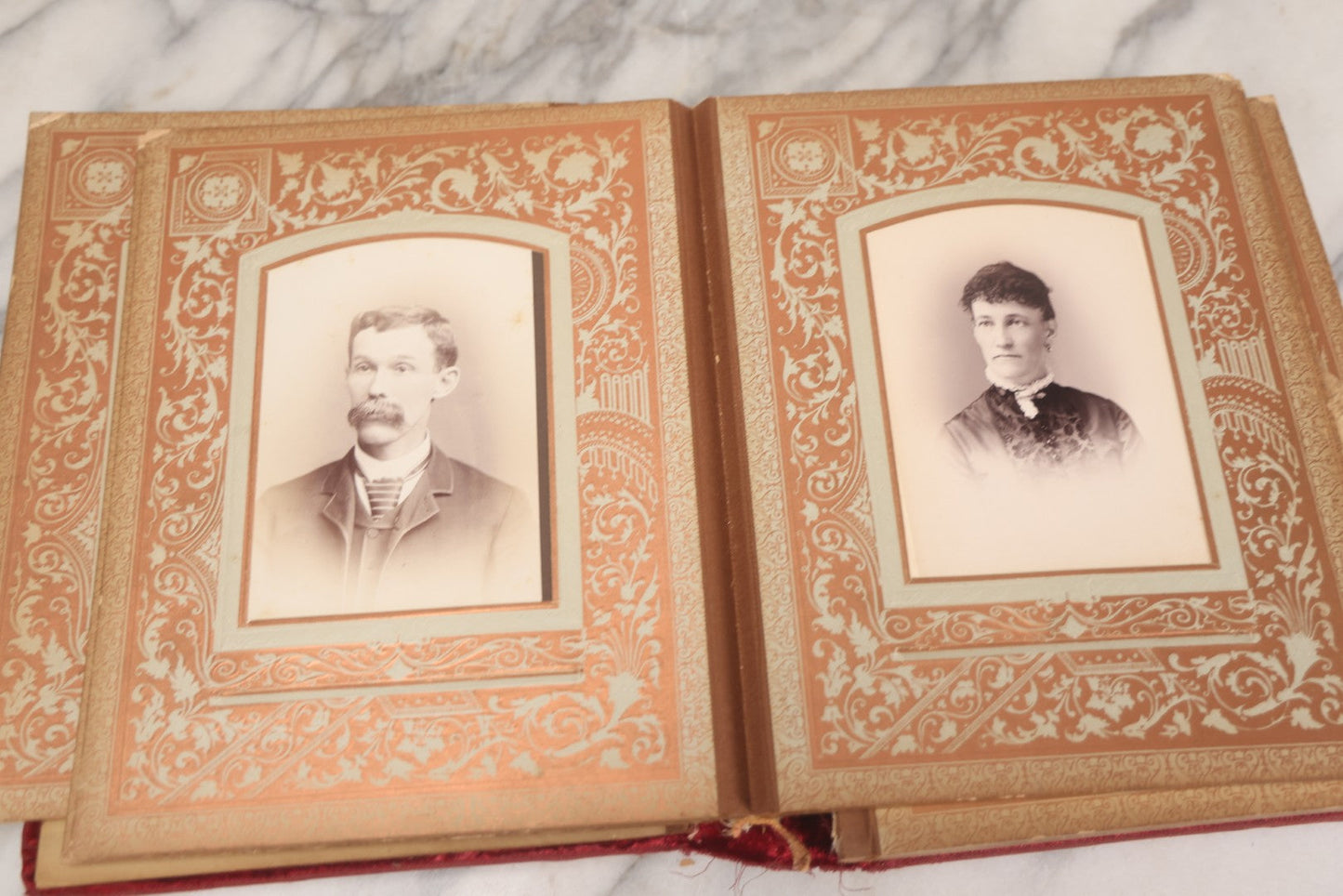 Lot 015 - Antique Victorian Photo Album With Red Velvet Covering, Containing 34 Cabinet Card Photographs, Including Woman Leaning On Gothic Chair, Group Of Four Women And Young Man In Uniform, Note Binding Completely Shot, Many Pages Loose