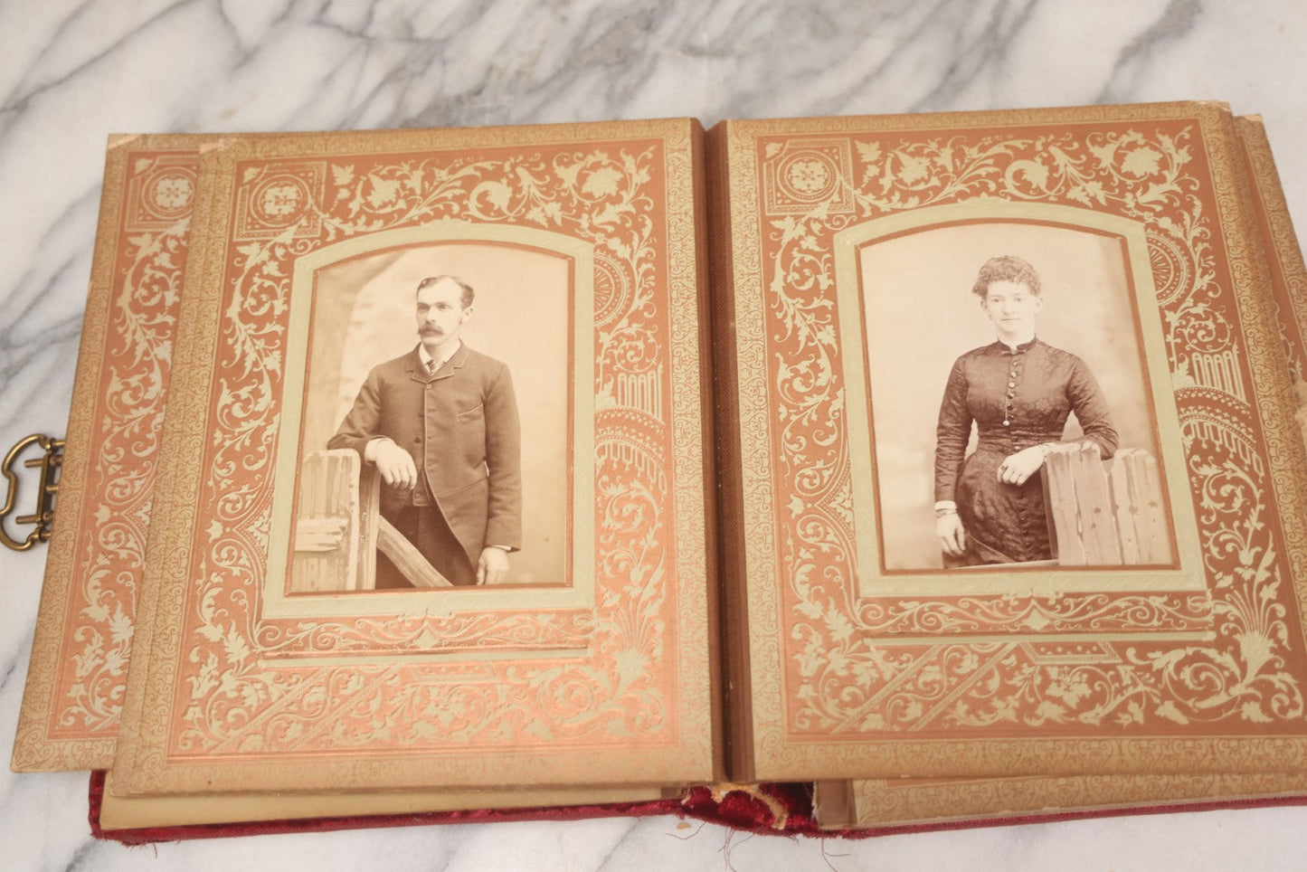 Lot 015 - Antique Victorian Photo Album With Red Velvet Covering, Containing 34 Cabinet Card Photographs, Including Woman Leaning On Gothic Chair, Group Of Four Women And Young Man In Uniform, Note Binding Completely Shot, Many Pages Loose