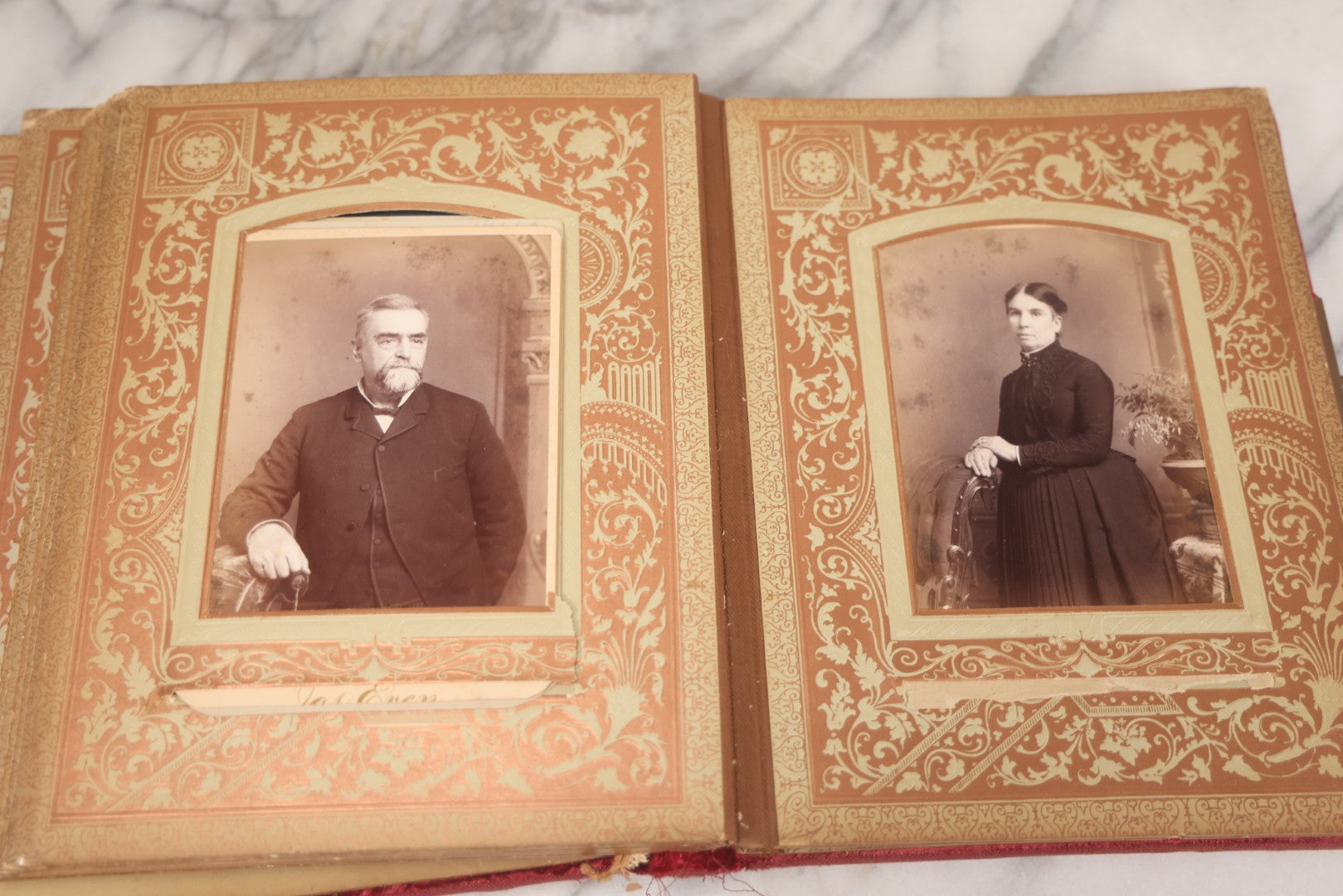 Lot 015 - Antique Victorian Photo Album With Red Velvet Covering, Containing 34 Cabinet Card Photographs, Including Woman Leaning On Gothic Chair, Group Of Four Women And Young Man In Uniform, Note Binding Completely Shot, Many Pages Loose