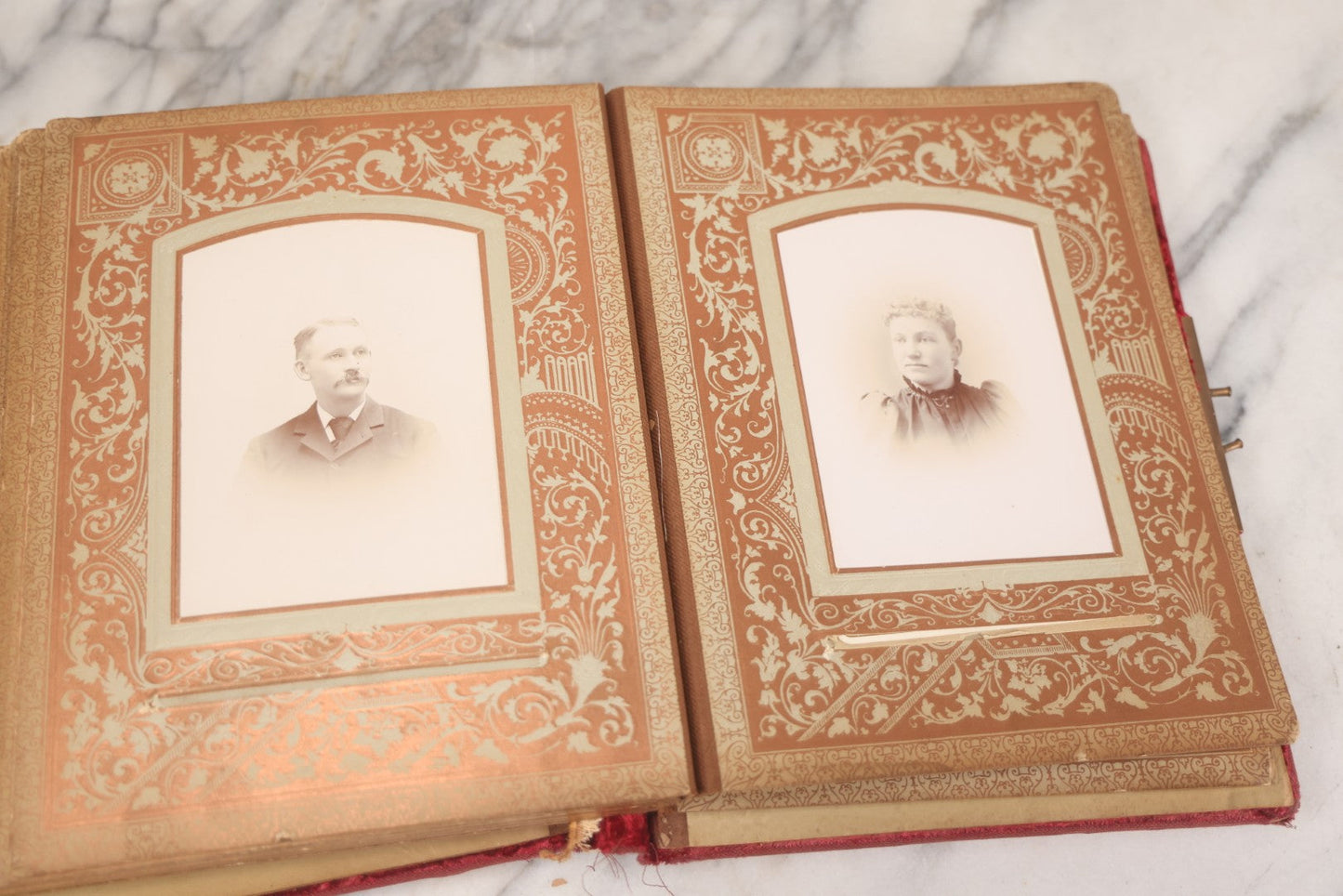 Lot 015 - Antique Victorian Photo Album With Red Velvet Covering, Containing 34 Cabinet Card Photographs, Including Woman Leaning On Gothic Chair, Group Of Four Women And Young Man In Uniform, Note Binding Completely Shot, Many Pages Loose