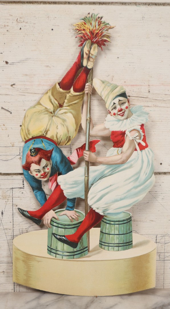 Lot 016 - Antique Die Cut Lithographed Acrobatic Circus Clowns Paper Display, Made In Germany For The R.T. Company, No. 10316, Class O, 10-1/2" x 19-1/2"