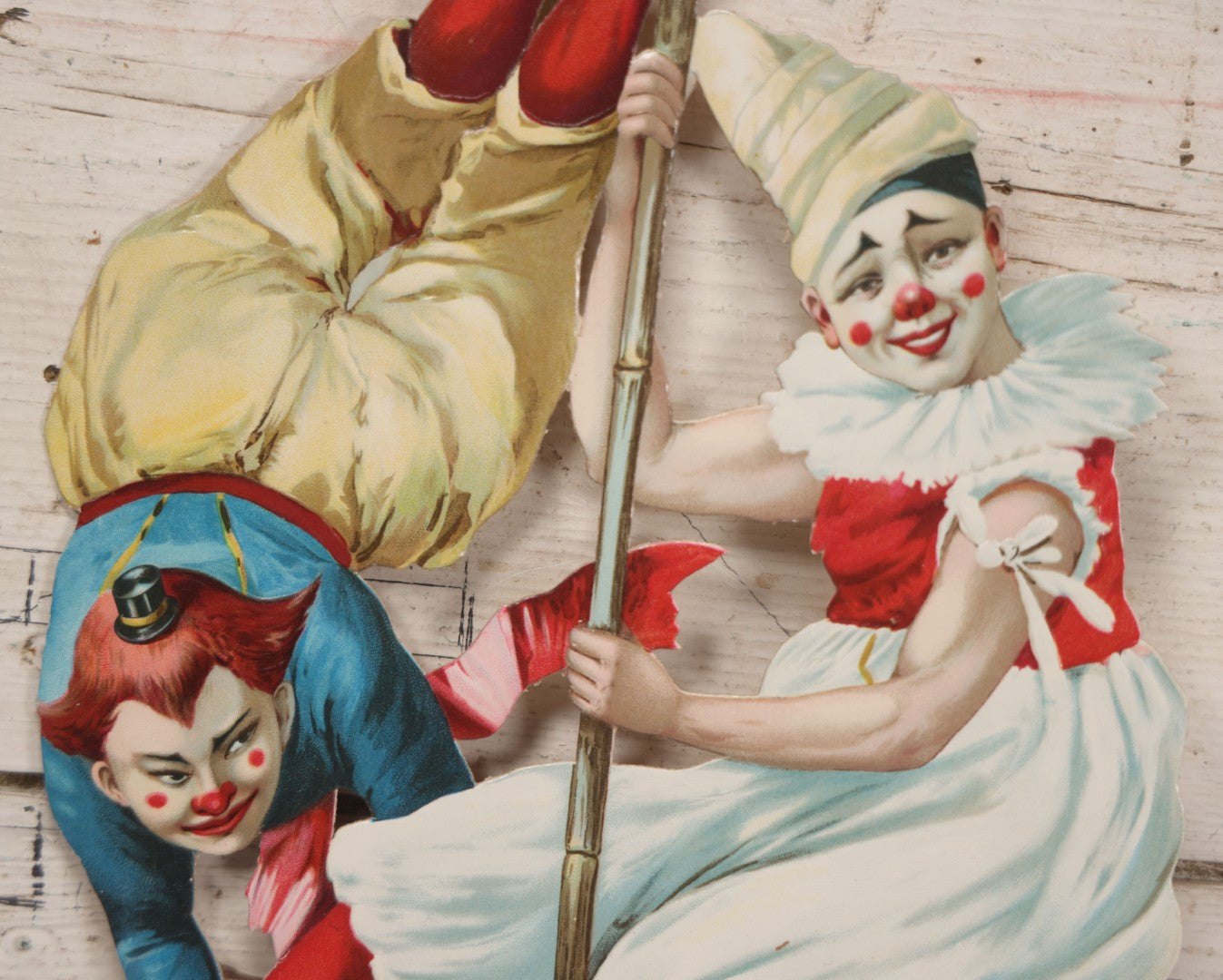 Lot 016 - Antique Die Cut Lithographed Acrobatic Circus Clowns Paper Display, Made In Germany For The R.T. Company, No. 10316, Class O, 10-1/2" x 19-1/2"