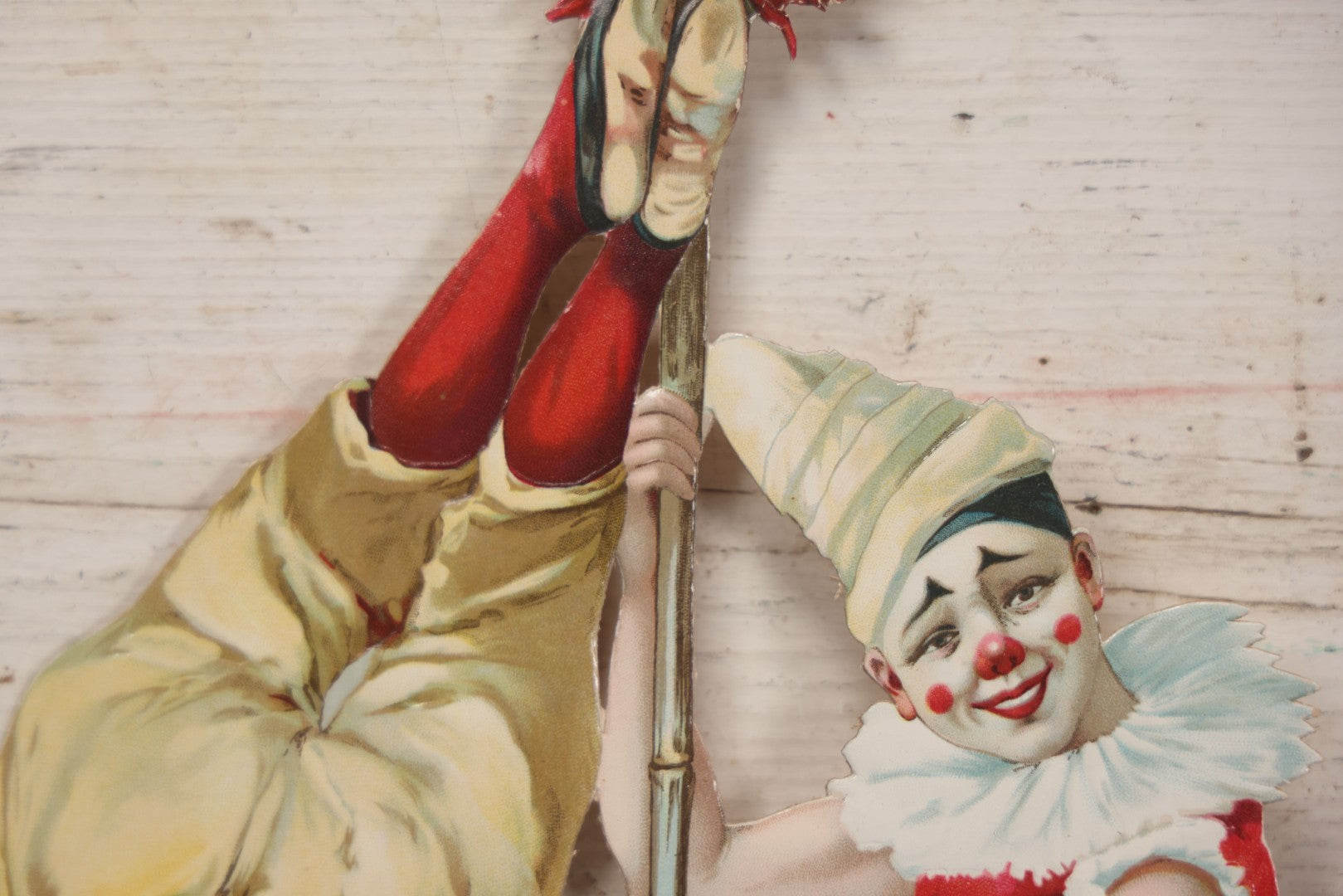 Lot 016 - Antique Die Cut Lithographed Acrobatic Circus Clowns Paper Display, Made In Germany For The R.T. Company, No. 10316, Class O, 10-1/2" x 19-1/2"