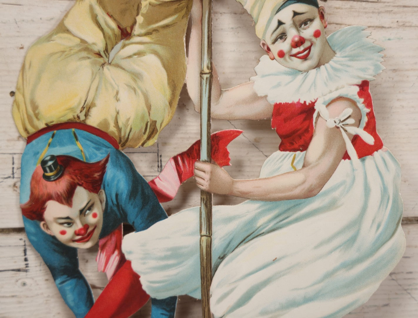 Lot 016 - Antique Die Cut Lithographed Acrobatic Circus Clowns Paper Display, Made In Germany For The R.T. Company, No. 10316, Class O, 10-1/2" x 19-1/2"