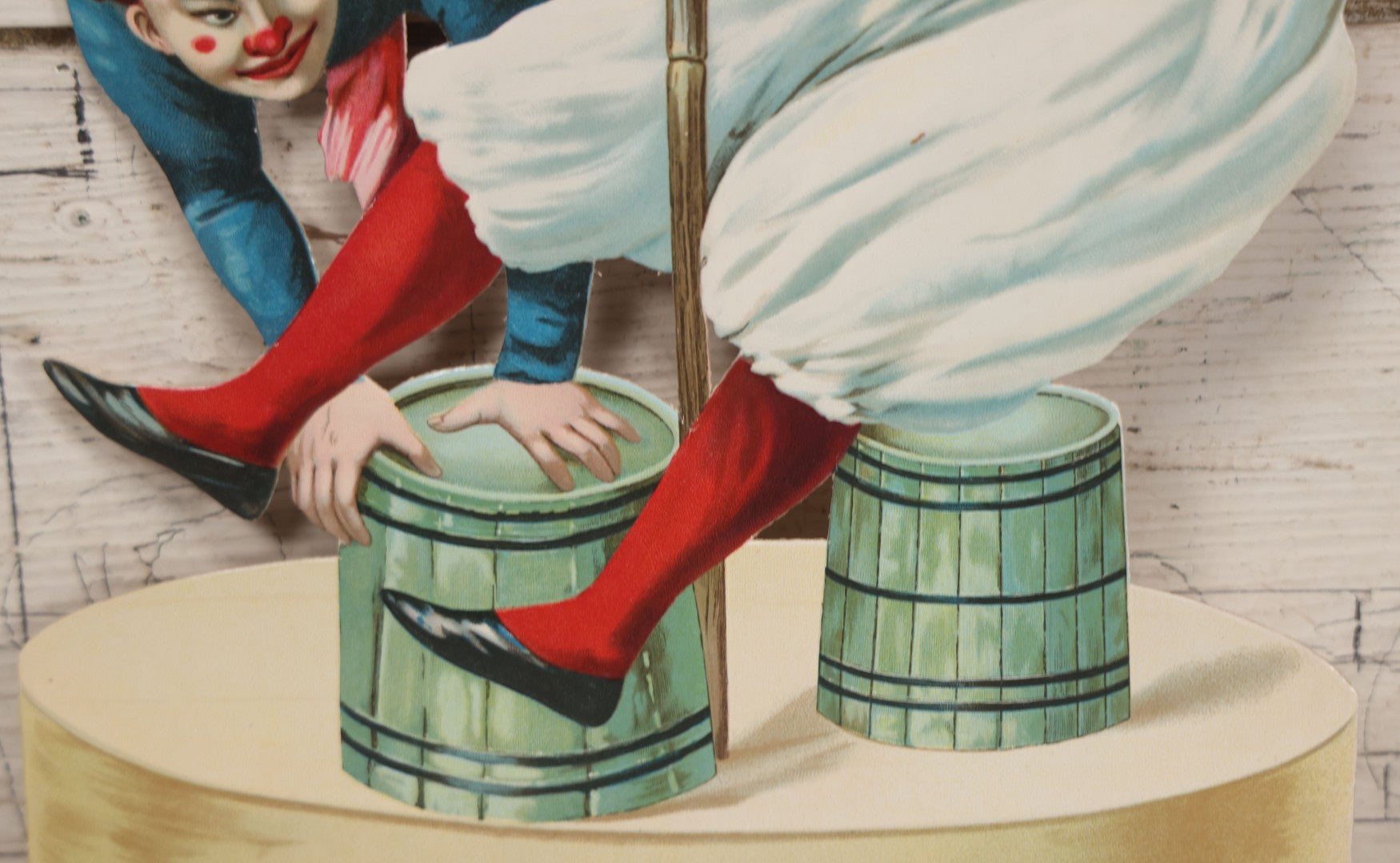 Lot 016 - Antique Die Cut Lithographed Acrobatic Circus Clowns Paper Display, Made In Germany For The R.T. Company, No. 10316, Class O, 10-1/2" x 19-1/2"