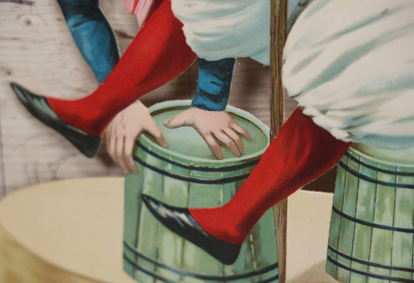 Lot 016 - Antique Die Cut Lithographed Acrobatic Circus Clowns Paper Display, Made In Germany For The R.T. Company, No. 10316, Class O, 10-1/2" x 19-1/2"