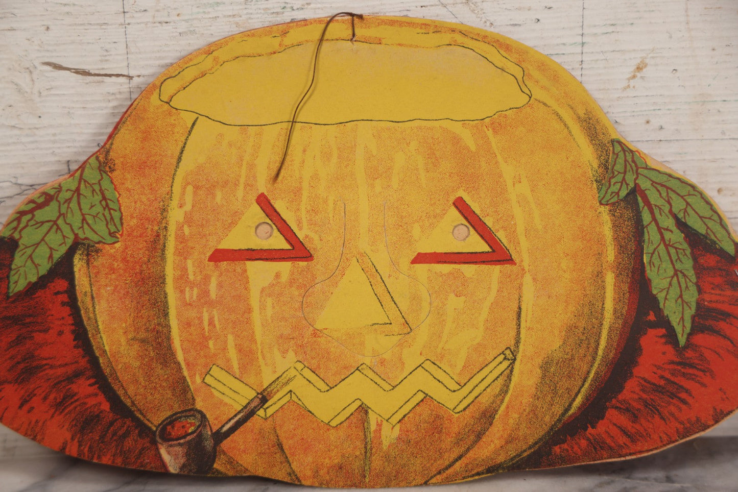 Lot 017 - Vintage Halloween Paper Cutout Mask Of Smoking Pumpkin Jack-O-Lantern J.O.L., Made In Germany, Unknown Manufacturer, 14-1/8" x 8-1/8"