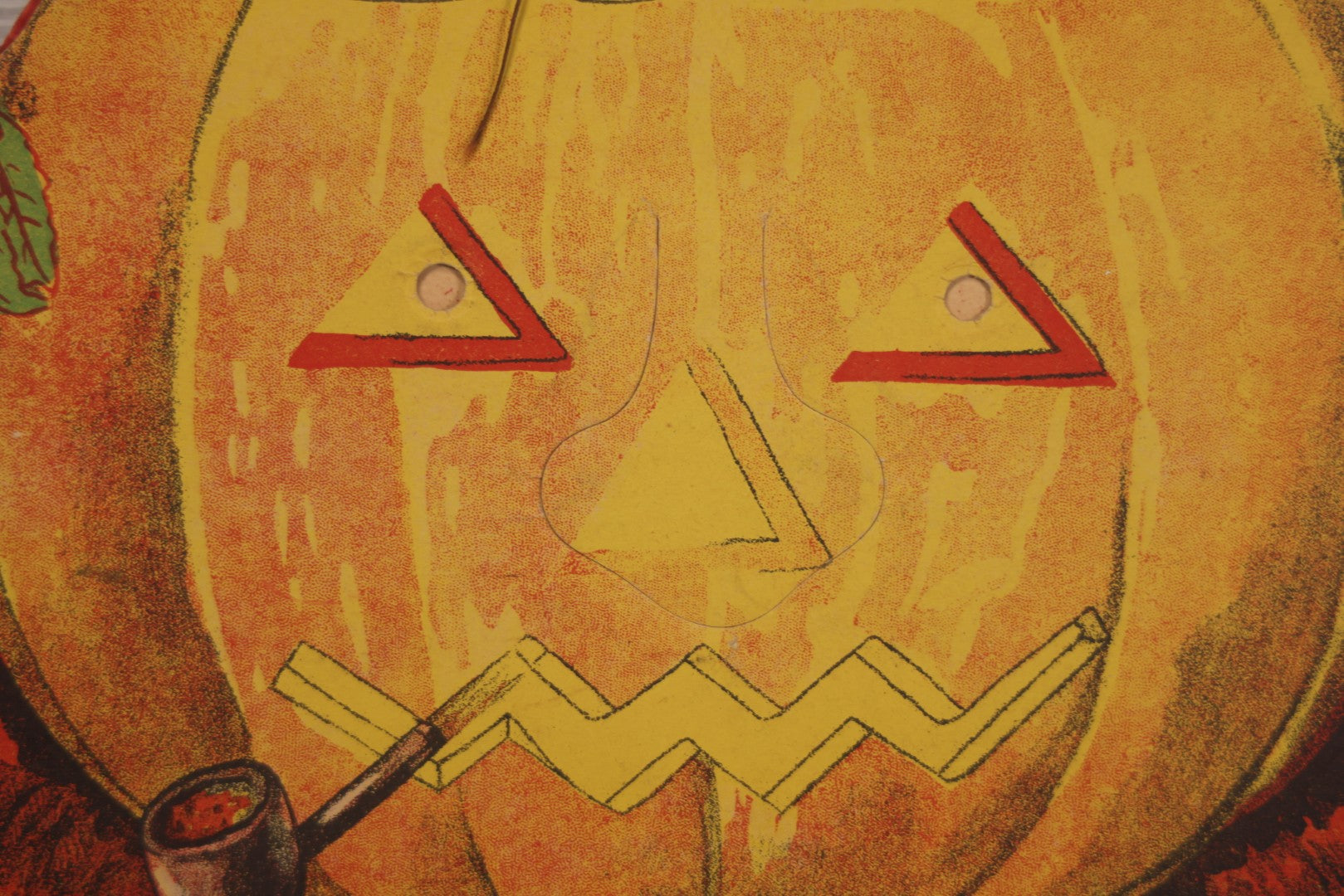 Lot 017 - Vintage Halloween Paper Cutout Mask Of Smoking Pumpkin Jack-O-Lantern J.O.L., Made In Germany, Unknown Manufacturer, 14-1/8" x 8-1/8"