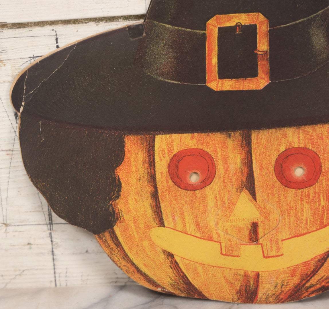 Lot 019 - Vintage Halloween Paper Cutout Mask Of Pumpkin Jack-O-Lantern J.O.L. Wearing Witch Hat, Made In Germany, Unknown Manufacturer, 14-1/8" x 12-1/2"