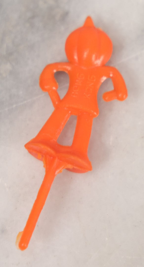 Lot 020 - Grouping Of Six Vintage Orange Plastic Halloween Cake Dessert Toppers Including Two Pumpkin Men And Four Witches, Made In Hong Kong, 2-1/2" L each