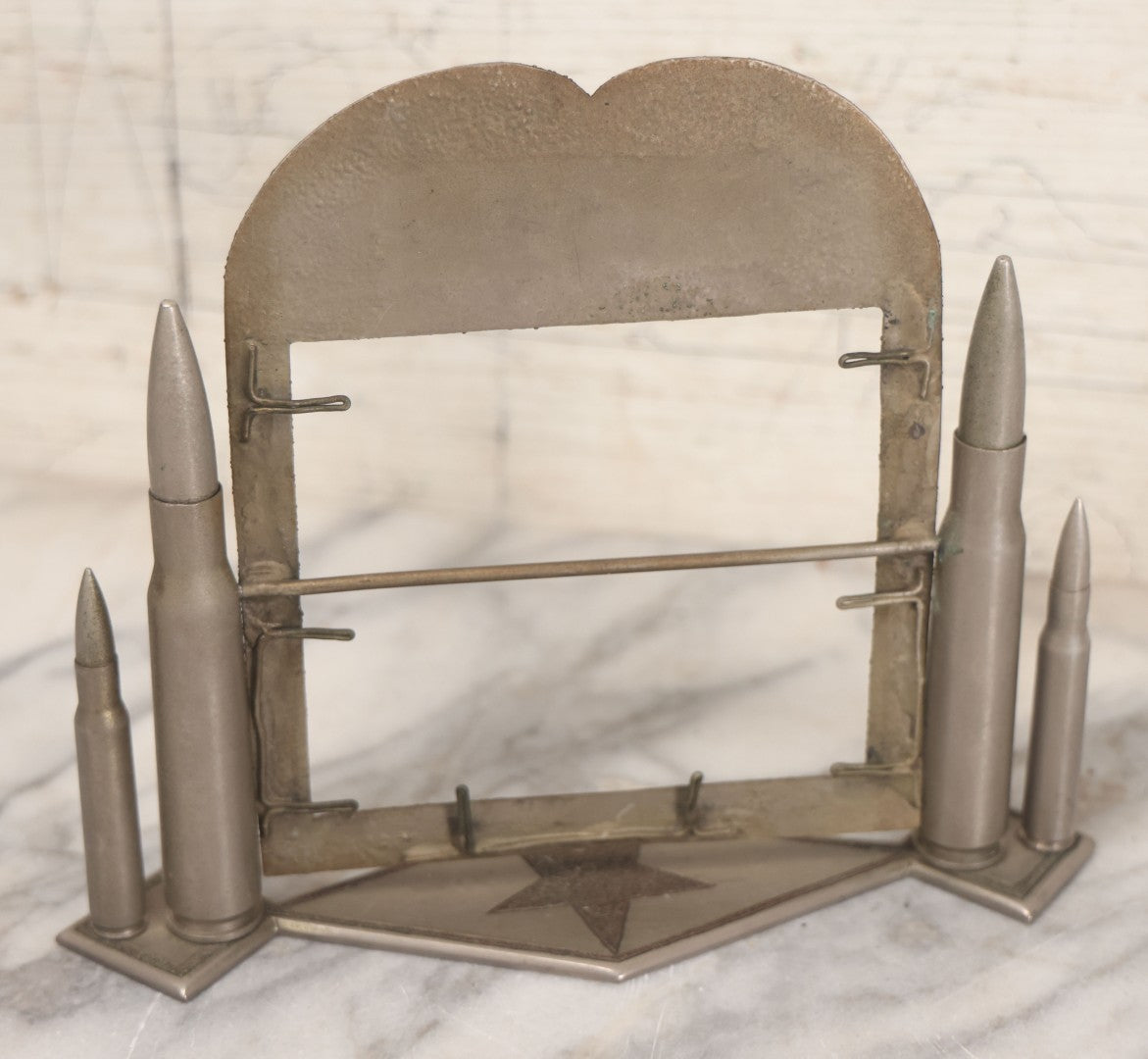 Lot 022 - Vintage Trench Art Swiveling Photo Frame With Silver Painted Bullet Shells, Hand Hammered Star Design And Other Hammered Details, Circa World War 1 Era