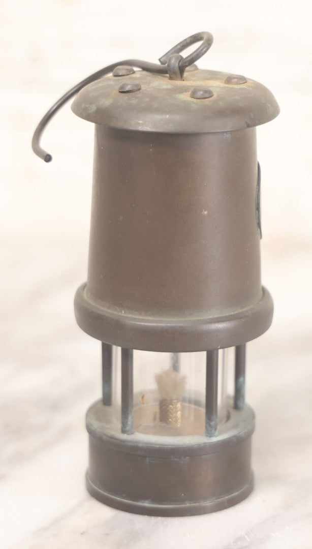 Lot 025 - Antique Brass Coal Miners Lamp Manufactured By Nedd Products Ltd., Glynneath W. Glamorgan, Made In Wales, With Welsh Dragon Emblem And Cymru Welsh Mark, Original Glass And Wick, 4-5/8" H