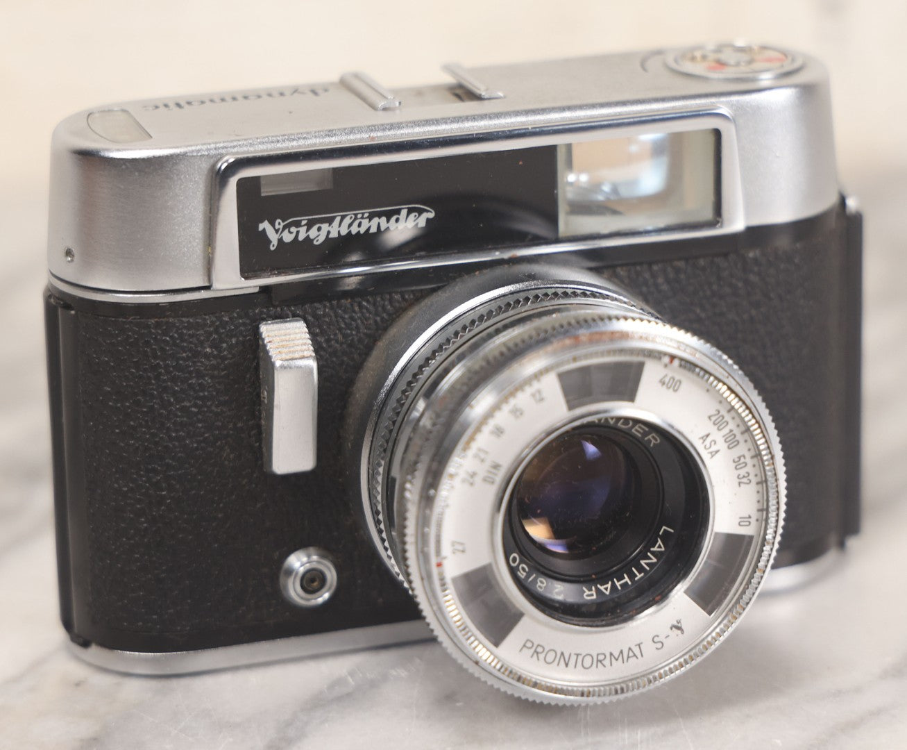 Lot 029 - Vintage Voigtlander Dynamatic 35mm Film Photography Camera With F/2.8 50mm Fixed Lens And Original Leather Carrying Case, Made In West Germany