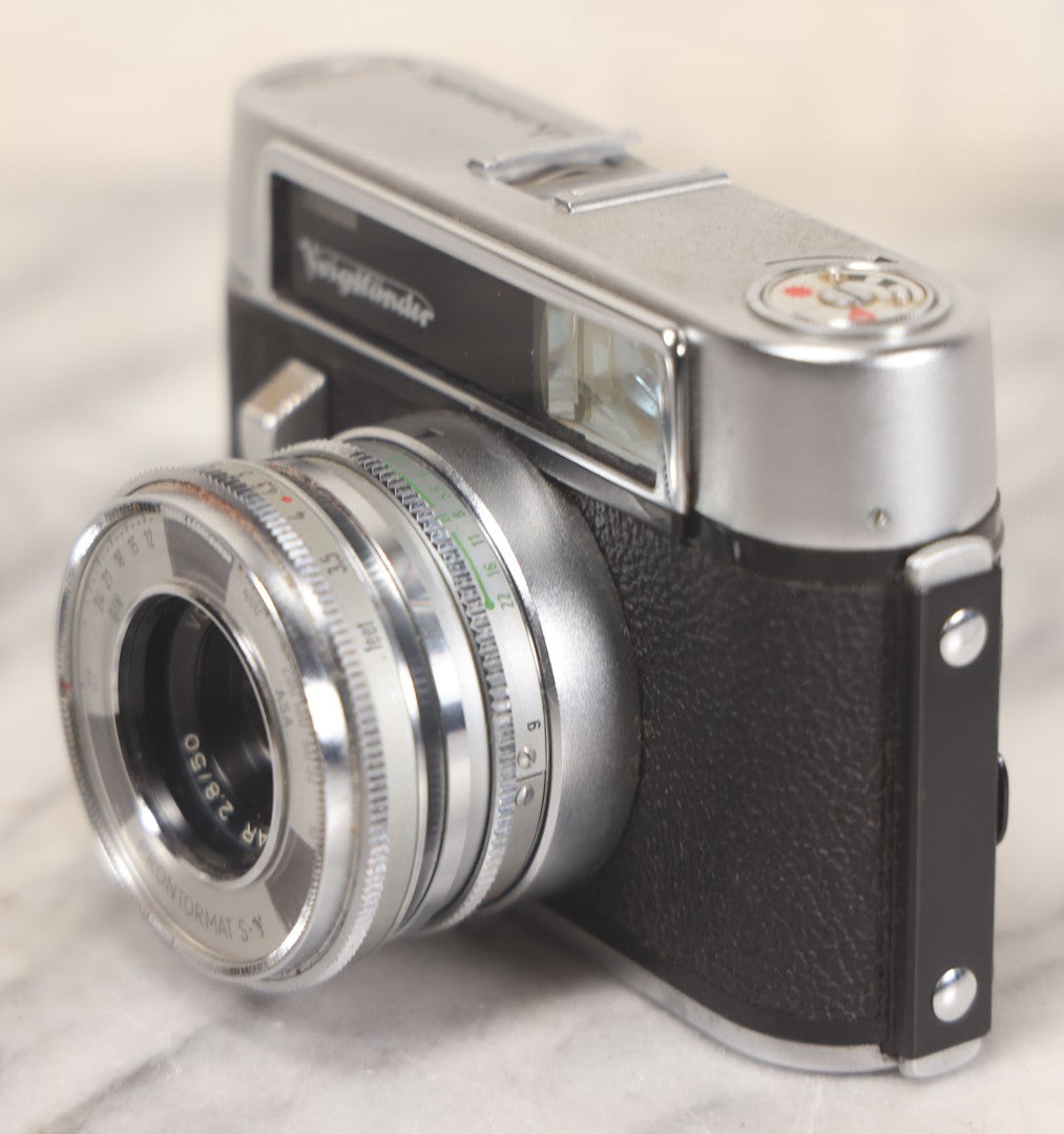 Lot 029 - Vintage Voigtlander Dynamatic 35mm Film Photography Camera With F/2.8 50mm Fixed Lens And Original Leather Carrying Case, Made In West Germany