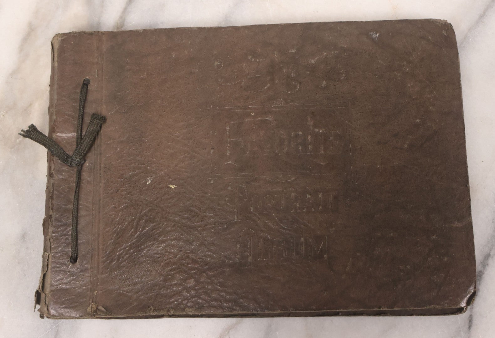 Lot 031 - Vintage Snapshot Photo Album With 46 Snapshot Photographs Including Occupational Photos Of Loggers At Work, Photos Of Children, Mountains, Rivers, And Other Vernacular Photos, Circa 1920s