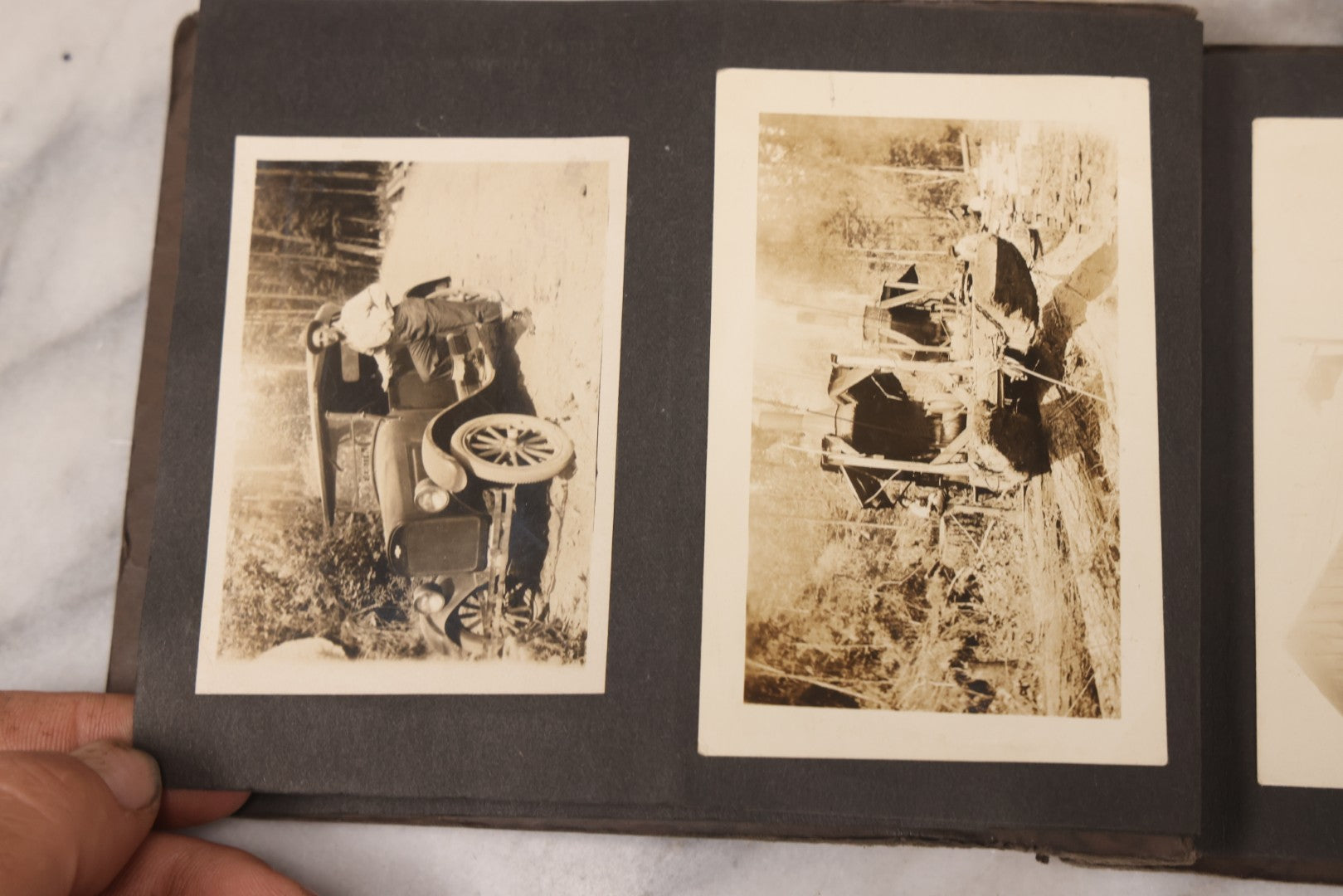 Lot 031 - Vintage Snapshot Photo Album With 46 Snapshot Photographs Including Occupational Photos Of Loggers At Work, Photos Of Children, Mountains, Rivers, And Other Vernacular Photos, Circa 1920s