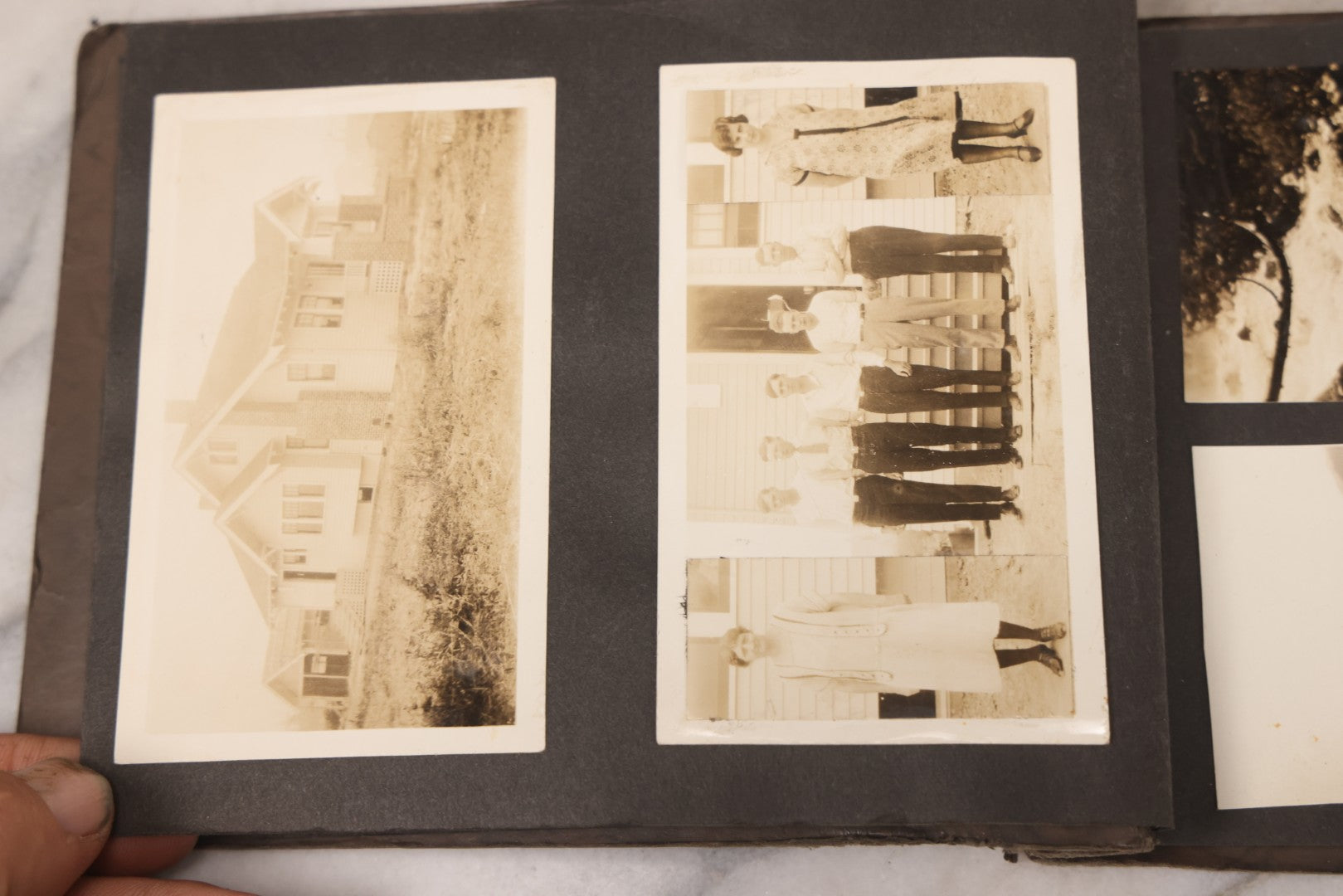 Lot 031 - Vintage Snapshot Photo Album With 46 Snapshot Photographs Including Occupational Photos Of Loggers At Work, Photos Of Children, Mountains, Rivers, And Other Vernacular Photos, Circa 1920s