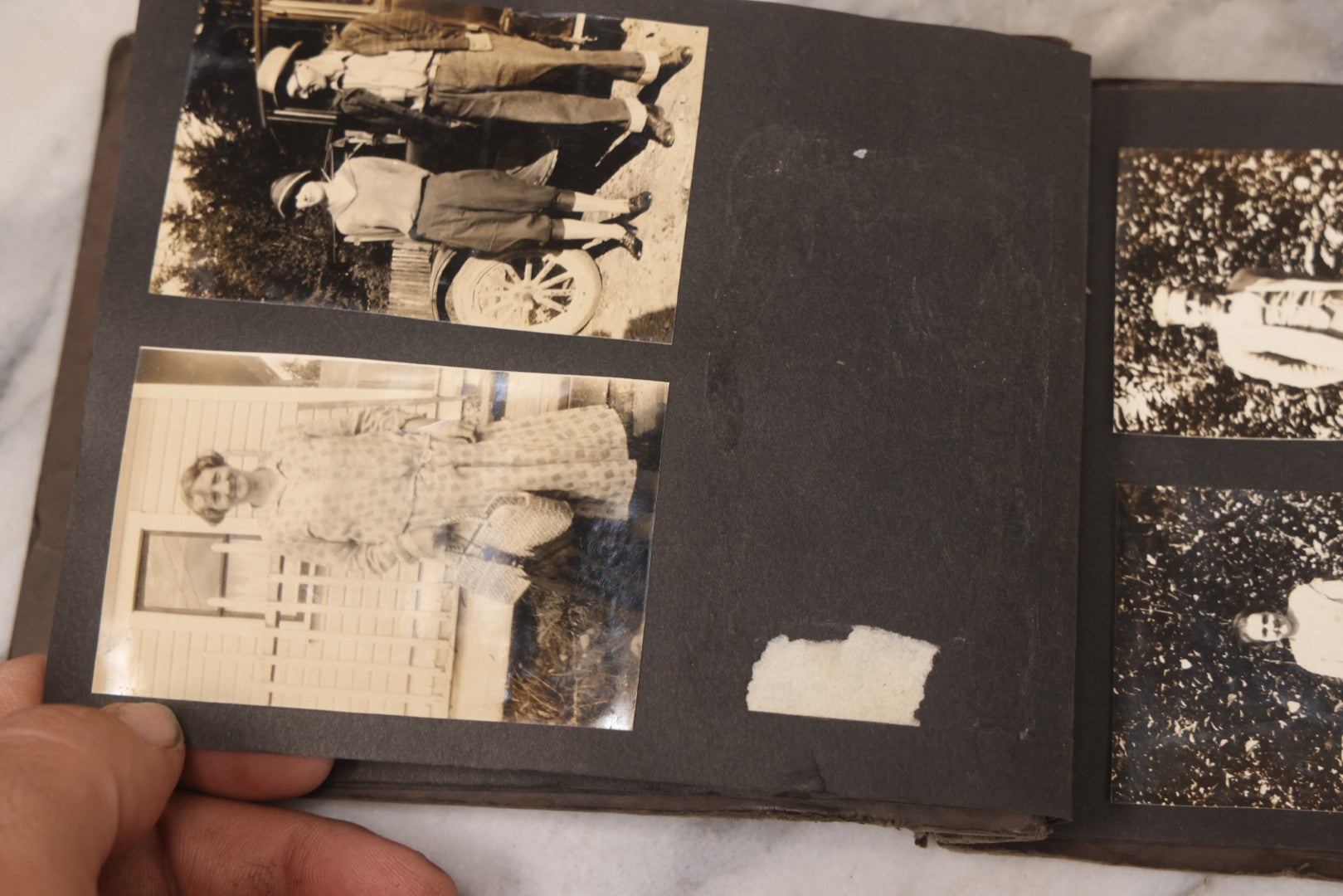 Lot 031 - Vintage Snapshot Photo Album With 46 Snapshot Photographs Including Occupational Photos Of Loggers At Work, Photos Of Children, Mountains, Rivers, And Other Vernacular Photos, Circa 1920s