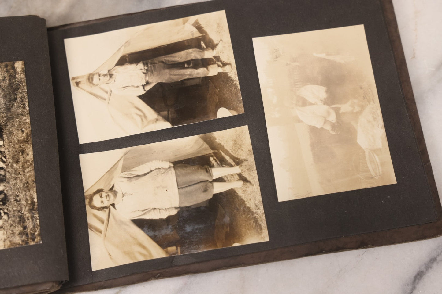 Lot 031 - Vintage Snapshot Photo Album With 46 Snapshot Photographs Including Occupational Photos Of Loggers At Work, Photos Of Children, Mountains, Rivers, And Other Vernacular Photos, Circa 1920s