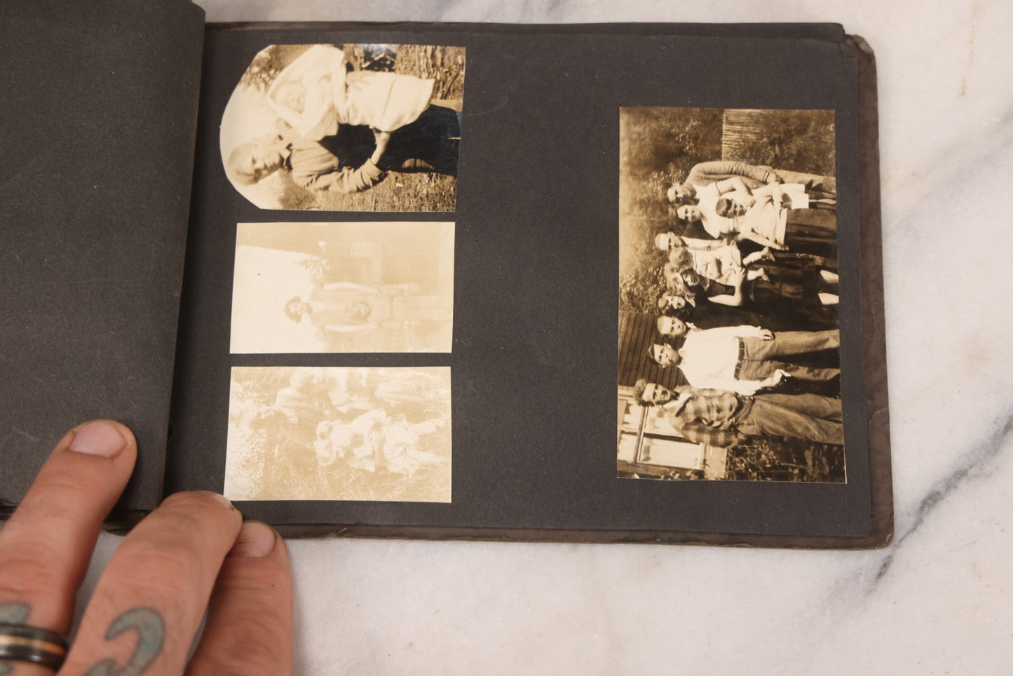 Lot 031 - Vintage Snapshot Photo Album With 46 Snapshot Photographs Including Occupational Photos Of Loggers At Work, Photos Of Children, Mountains, Rivers, And Other Vernacular Photos, Circa 1920s