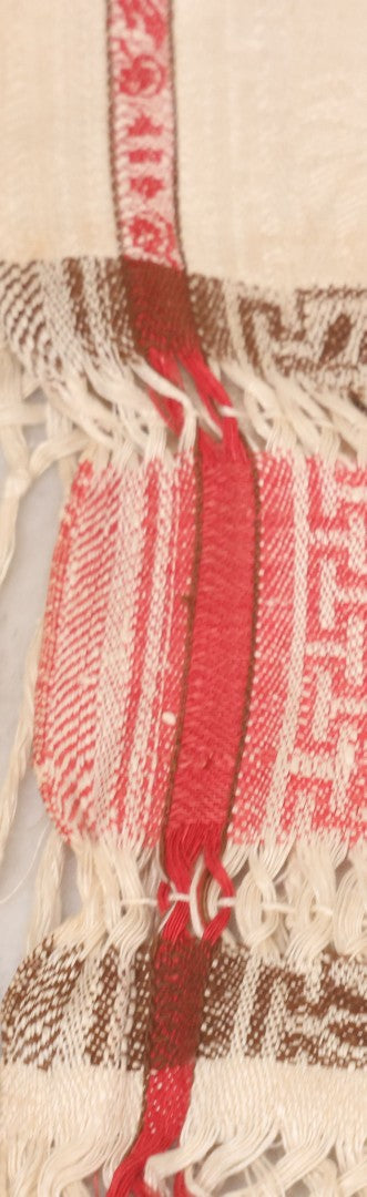 Lot 035 - Antique Damask Textile Fabric Bib With Detailed Red Embroidery Featuring All Seeing Eye, Comb And Brush And Hairpin Motifs