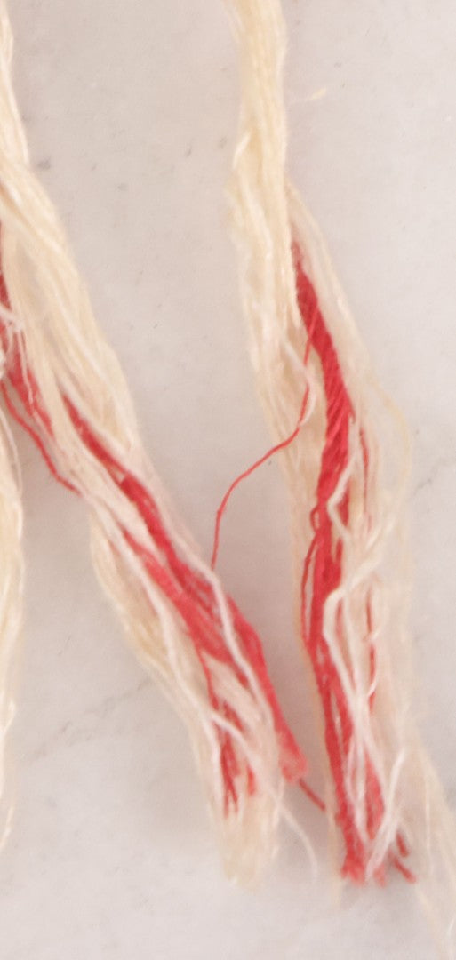 Lot 035 - Antique Damask Textile Fabric Bib With Detailed Red Embroidery Featuring All Seeing Eye, Comb And Brush And Hairpin Motifs