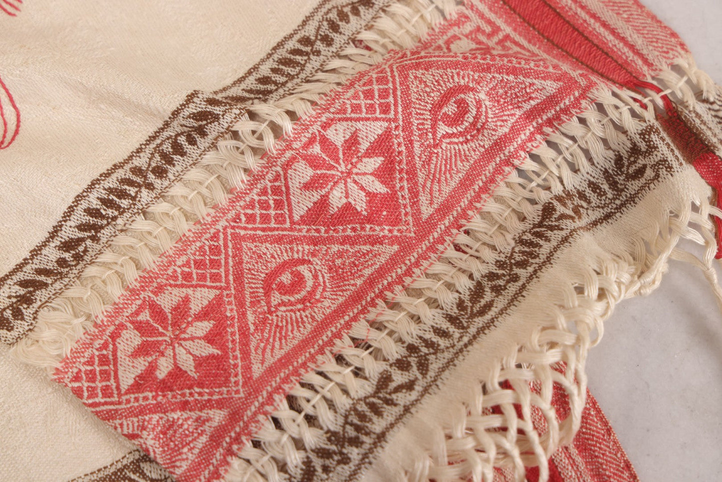 Lot 035 - Antique Damask Textile Fabric Bib With Detailed Red Embroidery Featuring All Seeing Eye, Comb And Brush And Hairpin Motifs