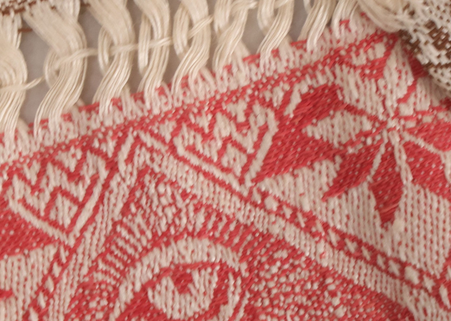 Lot 035 - Antique Damask Textile Fabric Bib With Detailed Red Embroidery Featuring All Seeing Eye, Comb And Brush And Hairpin Motifs