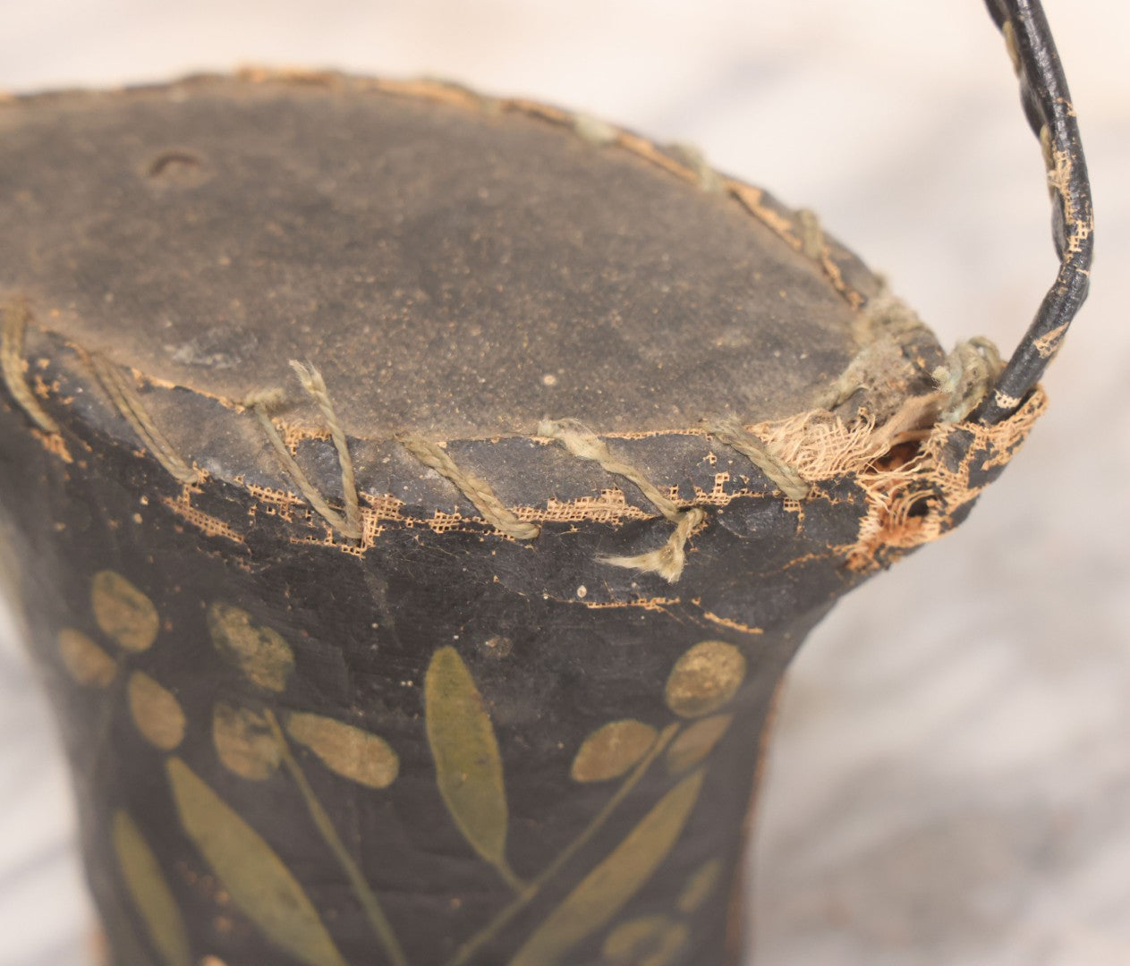 Lot 037 - Antique Painted Textile Doorstop Stuffed With Sawdust And Painted With White Flowers And Green Leaves, Note Splitting In Fabric, Some Sawdust Leaking