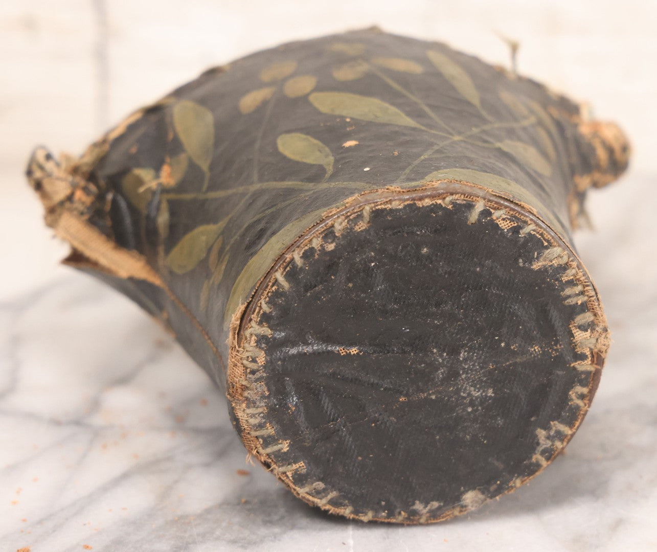 Lot 037 - Antique Painted Textile Doorstop Stuffed With Sawdust And Painted With White Flowers And Green Leaves, Note Splitting In Fabric, Some Sawdust Leaking