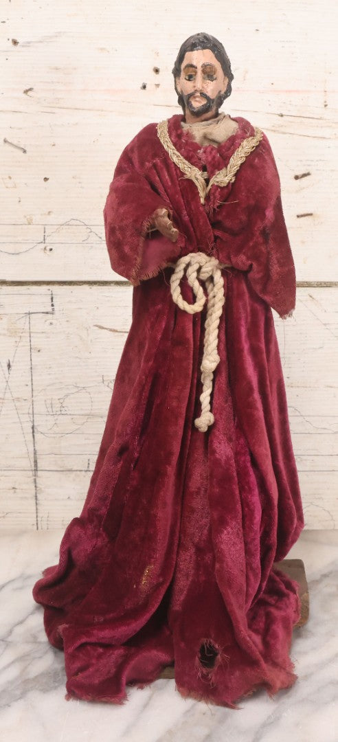 Lot 047 - Antique Handmade Religious Saint Statue Santos Figure With Carved Wooden Head, Hand And Feet, Original Paint, Real Hair Eyebrows, And Maroon Velvet Robe, Note Missing Hand, 16" H