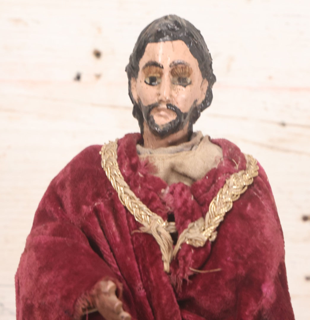 Lot 047 - Antique Handmade Religious Saint Statue Santos Figure With Carved Wooden Head, Hand And Feet, Original Paint, Real Hair Eyebrows, And Maroon Velvet Robe, Note Missing Hand, 16" H