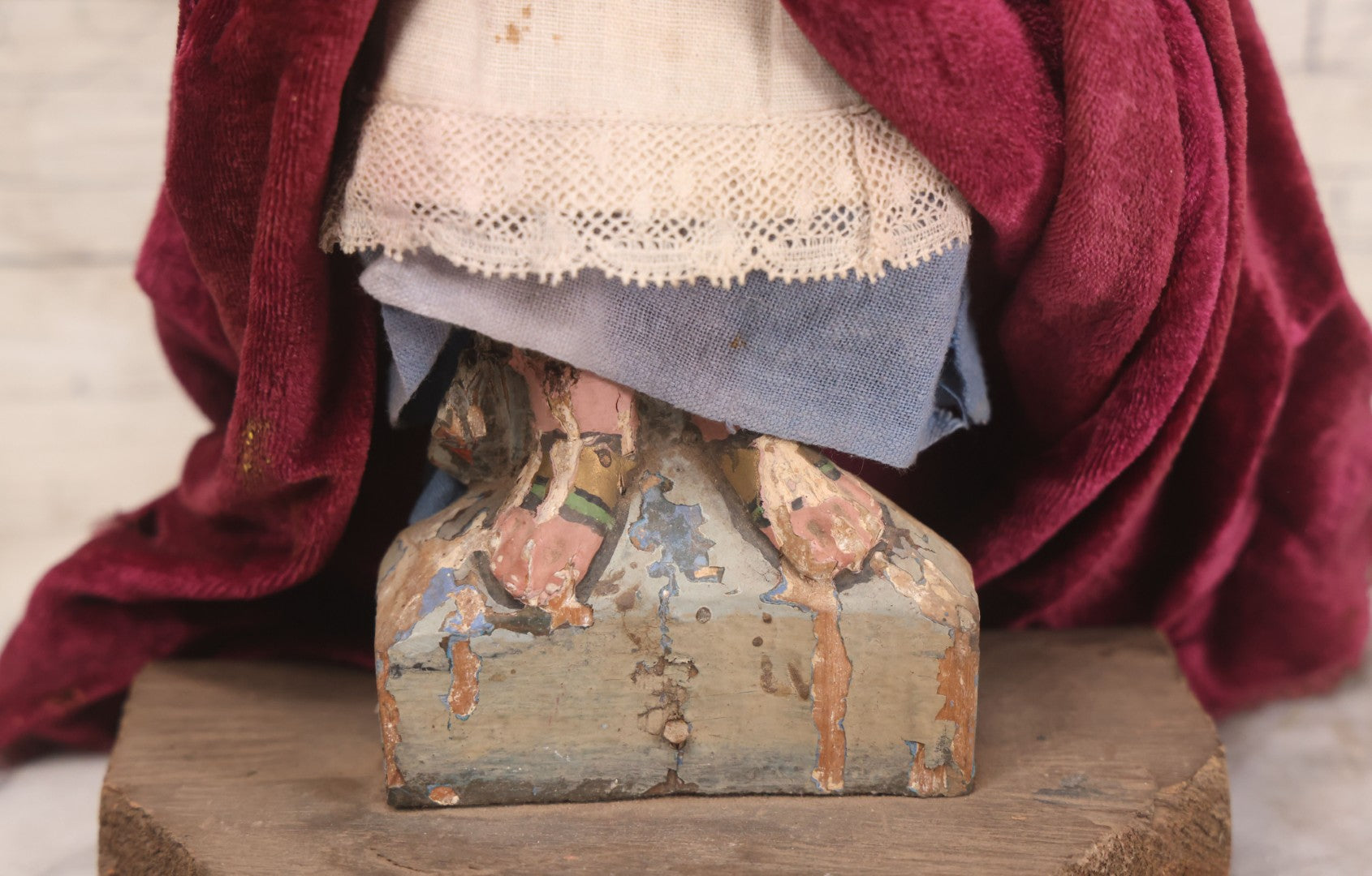 Lot 047 - Antique Handmade Religious Saint Statue Santos Figure With Carved Wooden Head, Hand And Feet, Original Paint, Real Hair Eyebrows, And Maroon Velvet Robe, Note Missing Hand, 16" H