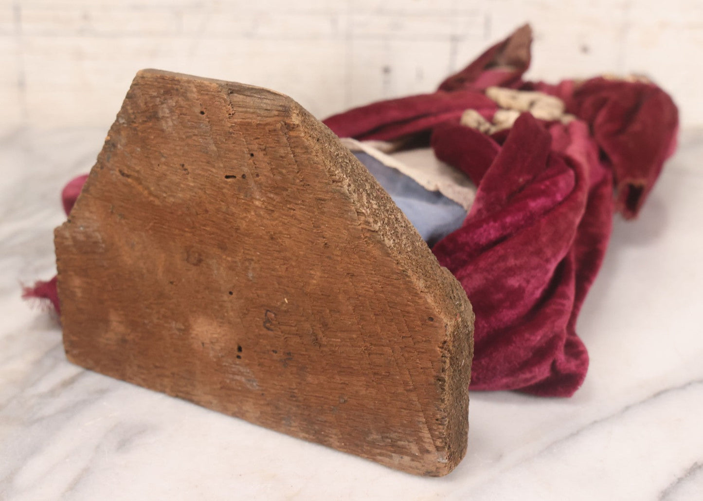 Lot 047 - Antique Handmade Religious Saint Statue Santos Figure With Carved Wooden Head, Hand And Feet, Original Paint, Real Hair Eyebrows, And Maroon Velvet Robe, Note Missing Hand, 16" H