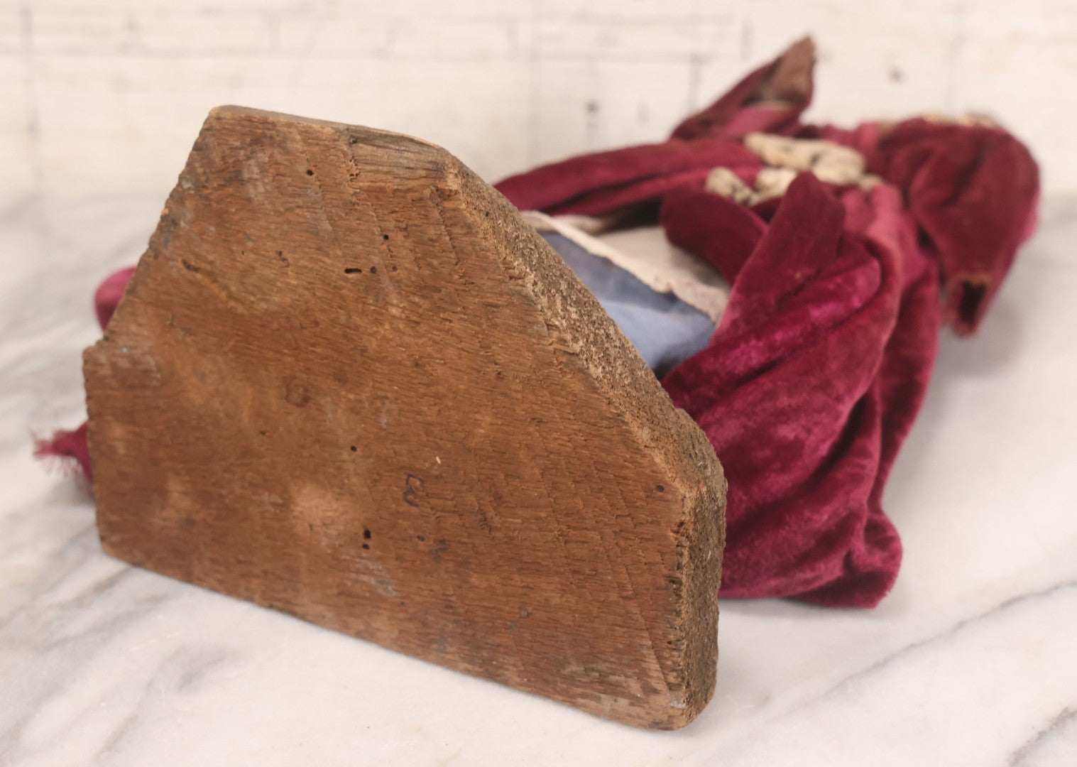 Lot 047 - Antique Handmade Religious Saint Statue Santos Figure With Carved Wooden Head, Hand And Feet, Original Paint, Real Hair Eyebrows, And Maroon Velvet Robe, Note Missing Hand, 16" H