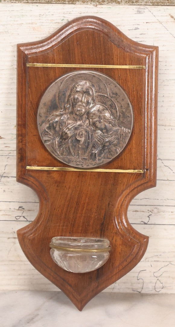 Lot 048 - Vintage Holy Water Font With Jesus And Child Silver Plated Medallion, Wooden Plaque, Glass Font, And Brass Details, 4" x 8-1/4"