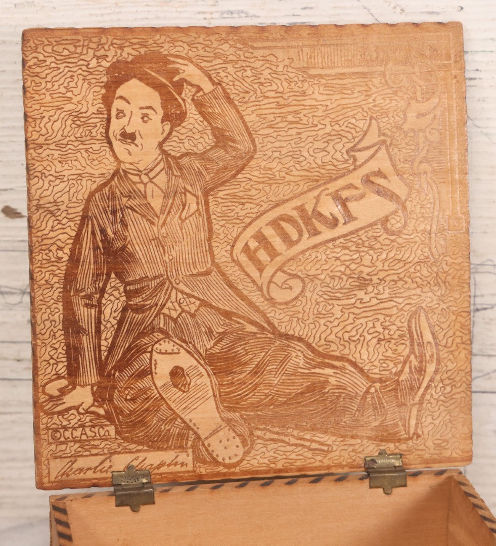 Lot 052 - Vintage Manufactured Pyrography Handkerchief Box With Charlie Chaplin On Interior And Exterior Of Lid, Copyright C.C.A.S. Co.