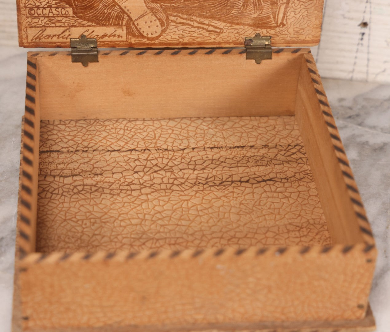 Lot 052 - Vintage Manufactured Pyrography Handkerchief Box With Charlie Chaplin On Interior And Exterior Of Lid, Copyright C.C.A.S. Co.