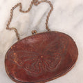 Lot 061 - Vintage Tooled Leather Butterfly Coin Purse With Brass Closure And Chain