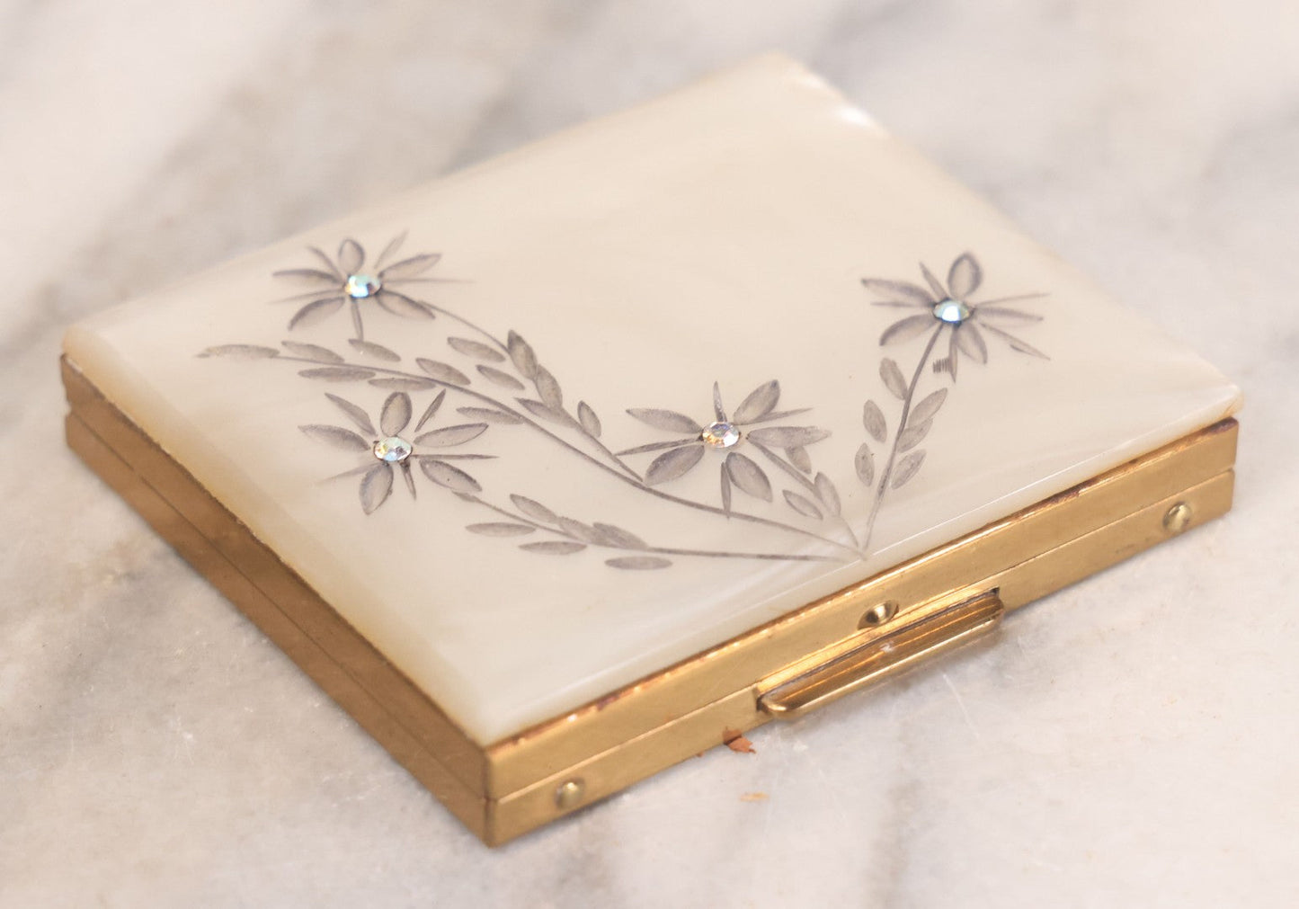Lot 062 - Vintage S.F. Co., Saks Fifth Avenue Pearlescent Compact With Etched Flowers And Faux Diamonds, Original Powder Pad And Mirror
