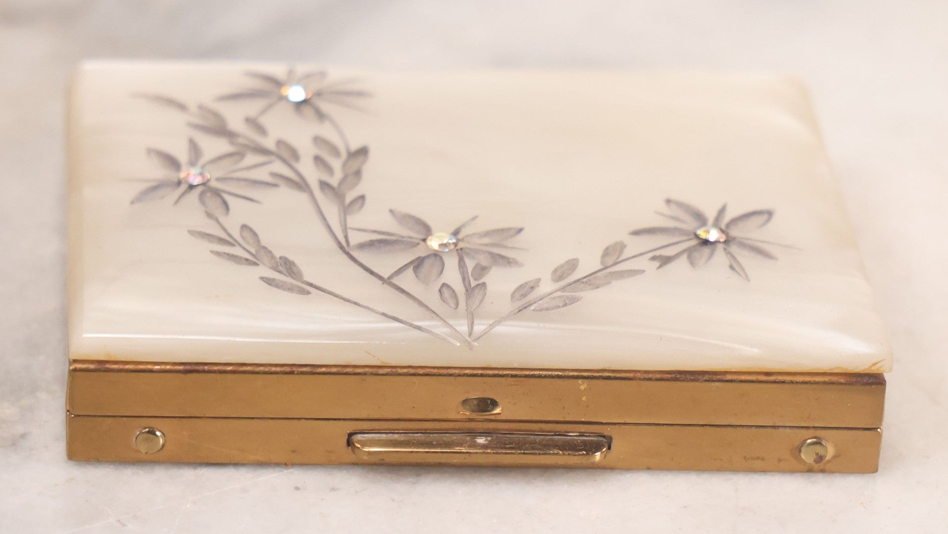 Lot 062 - Vintage S.F. Co., Saks Fifth Avenue Pearlescent Compact With Etched Flowers And Faux Diamonds, Original Powder Pad And Mirror