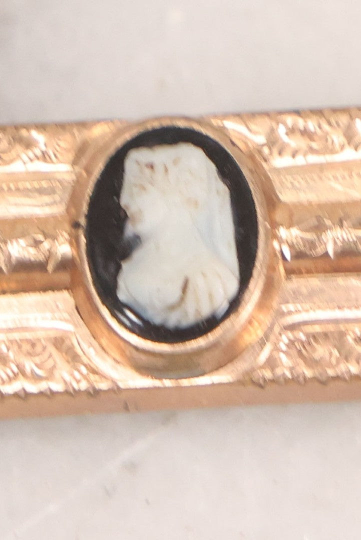 Lot 066 - Antique Victorian Gold Toned Bar Brooch With Black And White Woman Cameo, 2-3/4" L