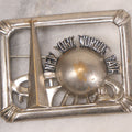 Lot 067 - Vintage New York World's Fair Silver Colored Brooch With Trylon And Perisphere, Marked Copyright N.Y.W.E., License No. 1625