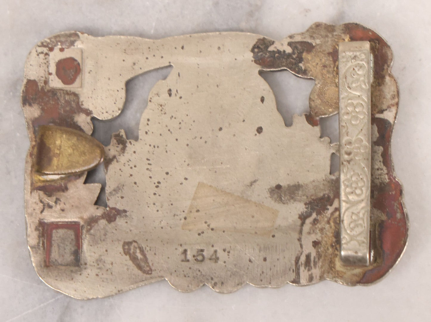 Lot 069 - Vintage Reproduction Lillie Langtry, "The Jersey Lily," British Socialite And Actress, Metal Belt Buckle, Made After The Original 1901 Tiffany Design, 3-1/4" x 2-1/4"