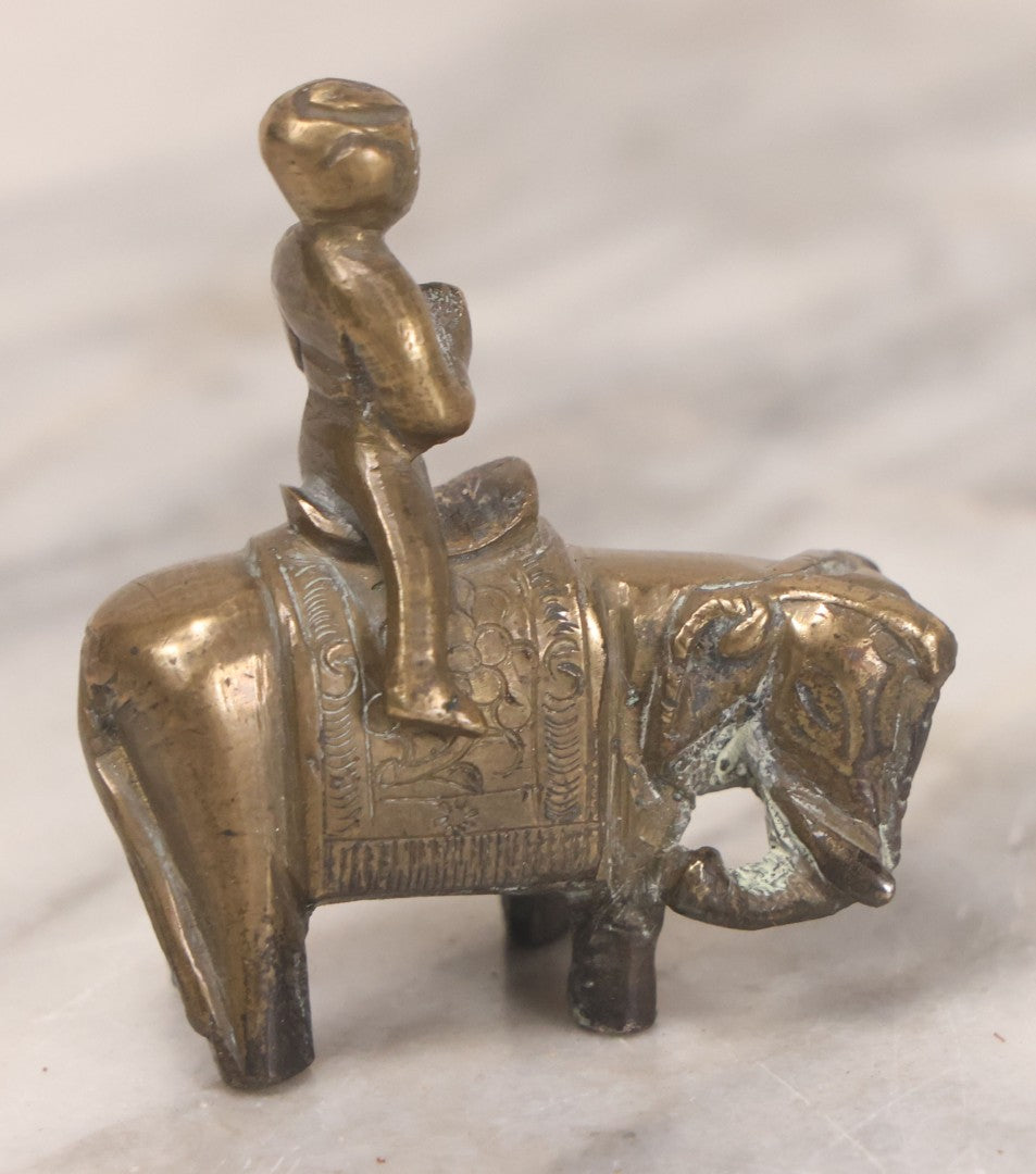 Lot 073 - Vintage Brass Indian Figurine Of Praying Man Riding Elephant, 2-1/8" H