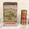 Lot 075 - Four Piece Vintage Tin Grouping Including Bugler Cigarette Tobacco, Niles & Moser's Handmade Quality Cigars, Folger's Paprika, And John D. Jr. Hand Soap