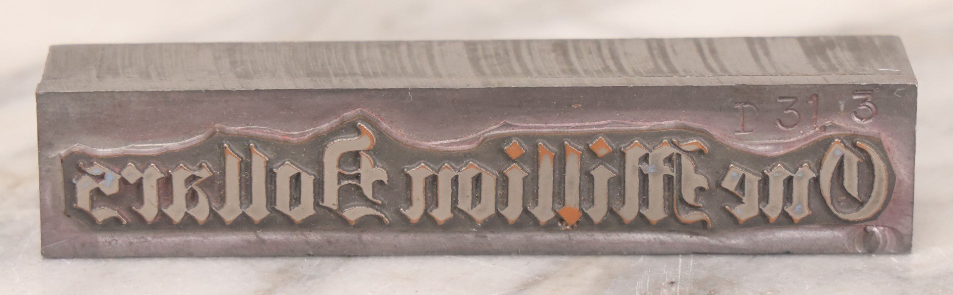 Lot 076 - Vintage Heavy Metal Printing Block For "One Million Dollars"